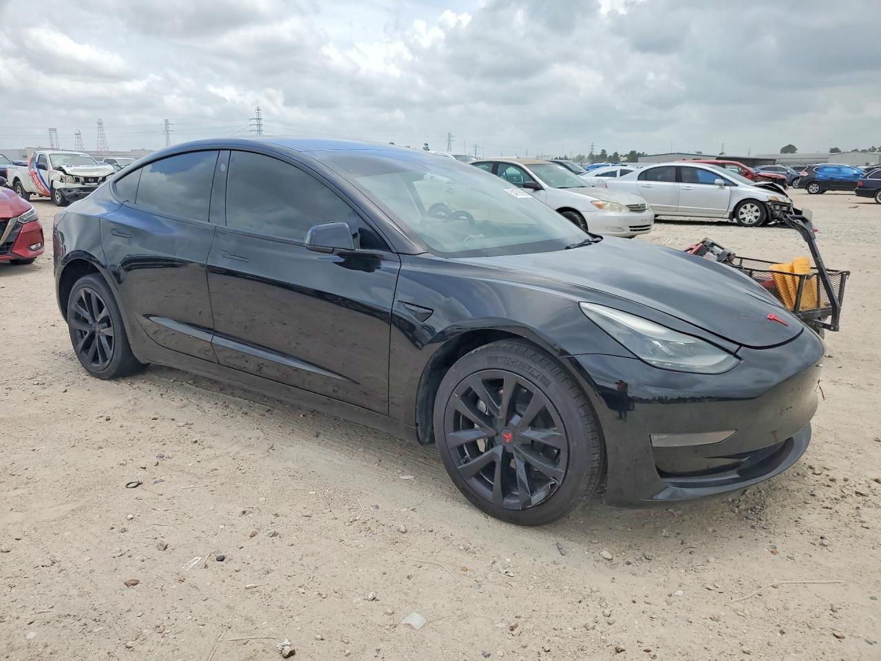 2023 Tesla Model 3 - Фото 4