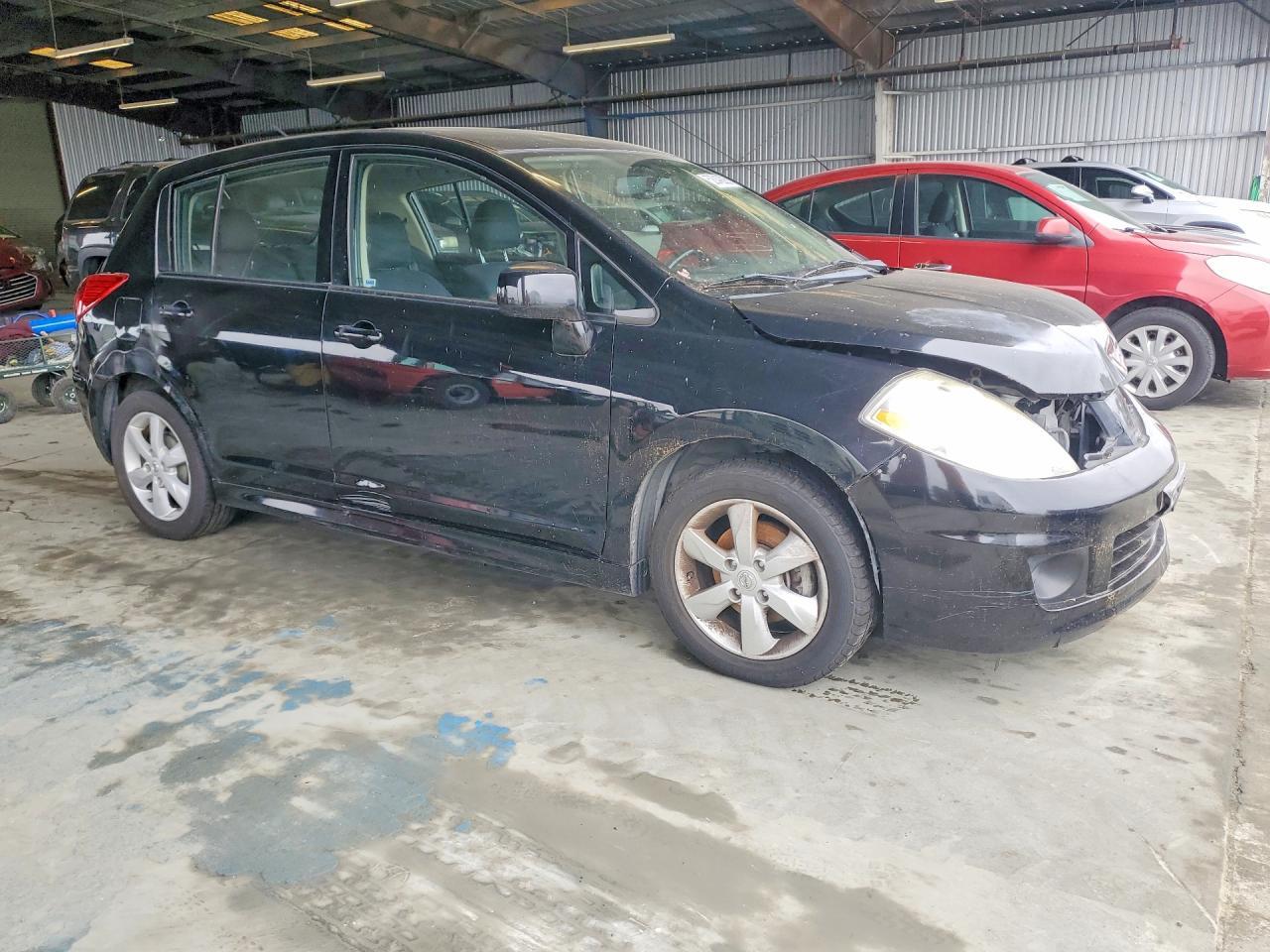 2012 Nissan Versa - Фото 4