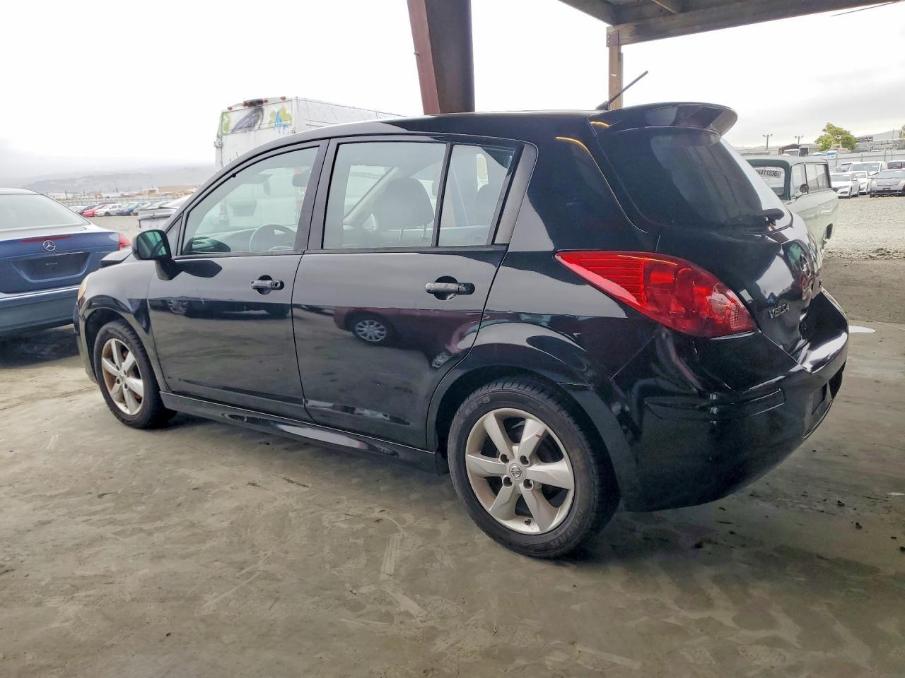 2012 Nissan Versa - Фото 2