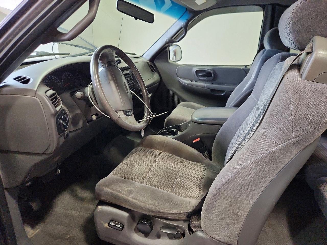 2002 Ford F150 - Фото 7