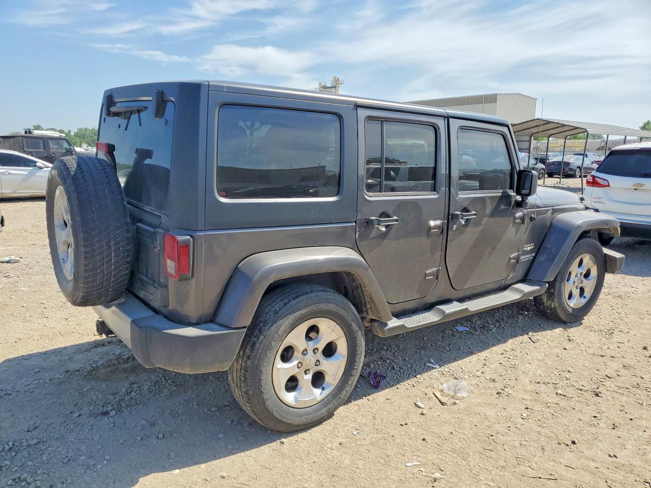 2014 Jeep Wrangler Unlimited Sahara - Фото 3