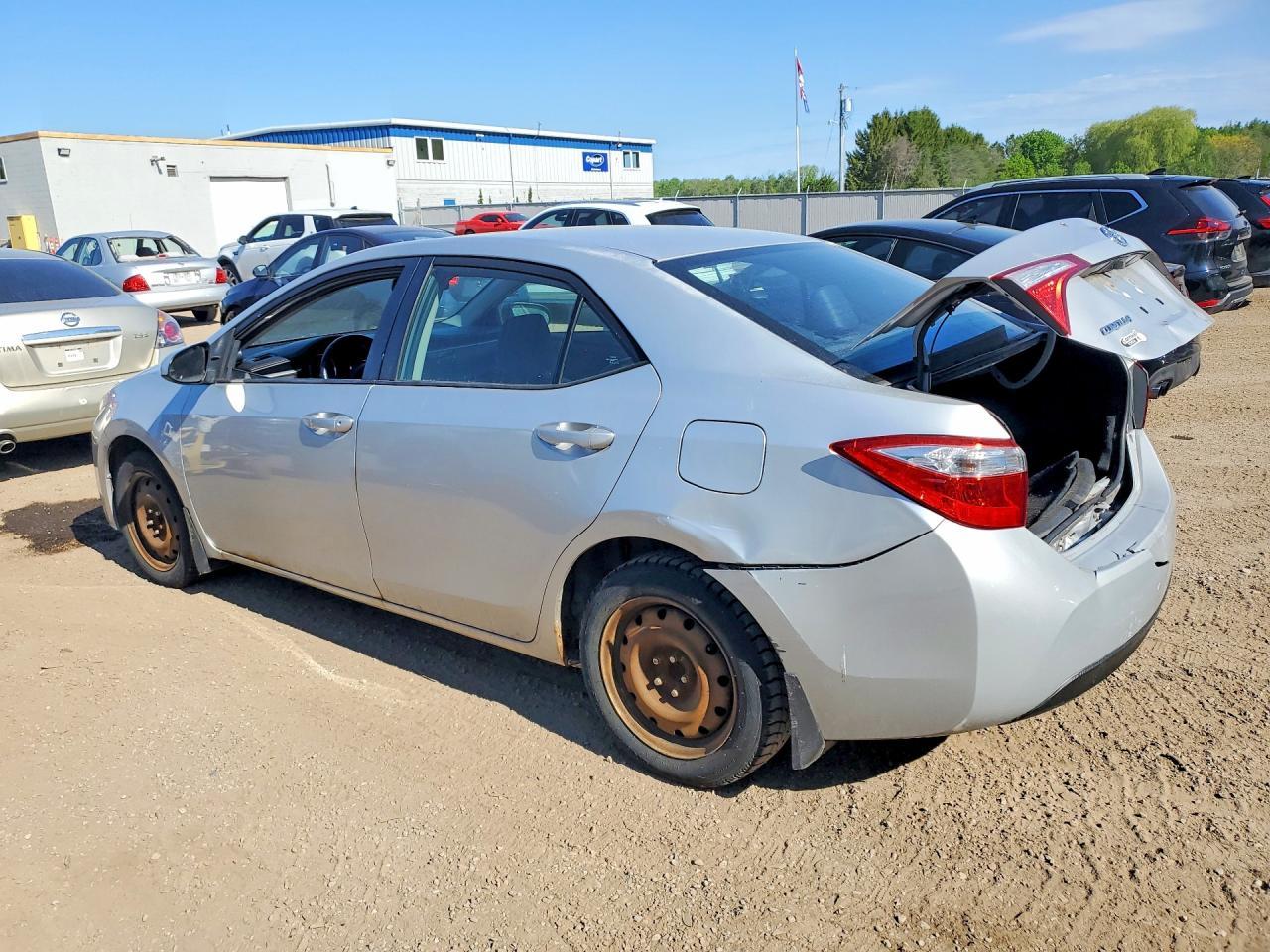 2014 Toyota Corolla L - Фото 2