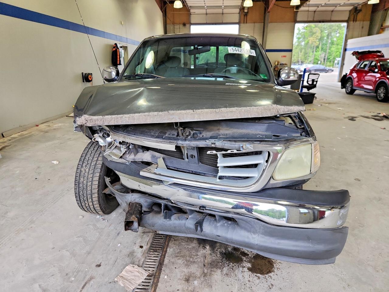 2002 Ford F150 - Фото 5