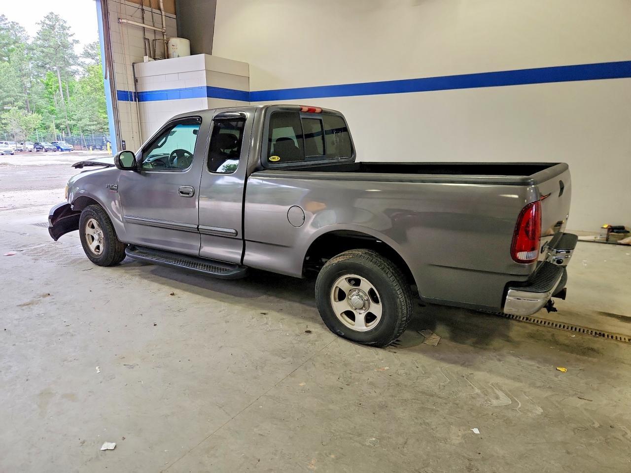 2002 Ford F150 - Фото 2