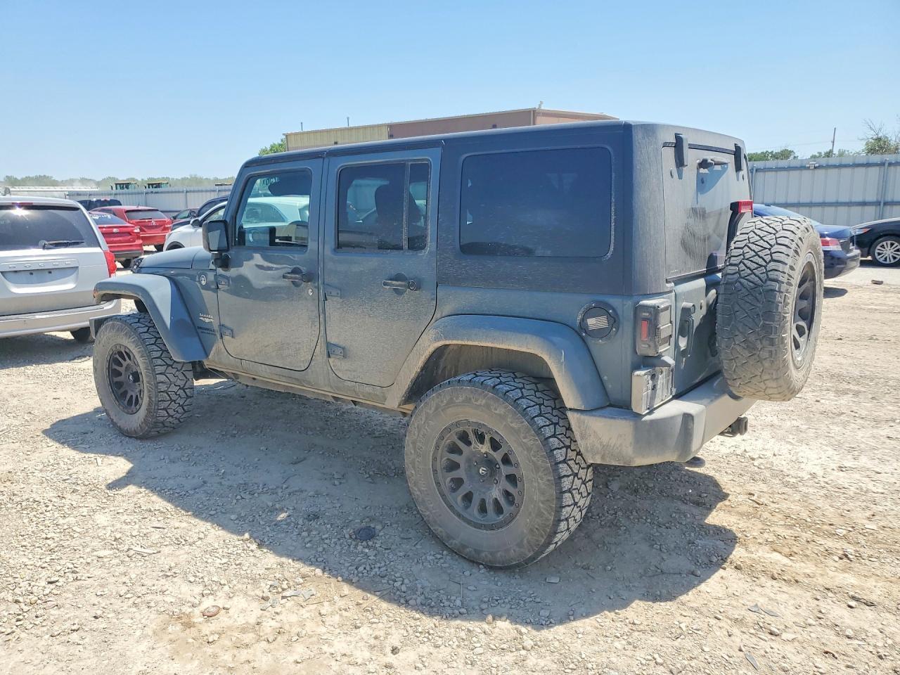 2014 Jeep Wrangler Unlimited Sahara - Фото 2