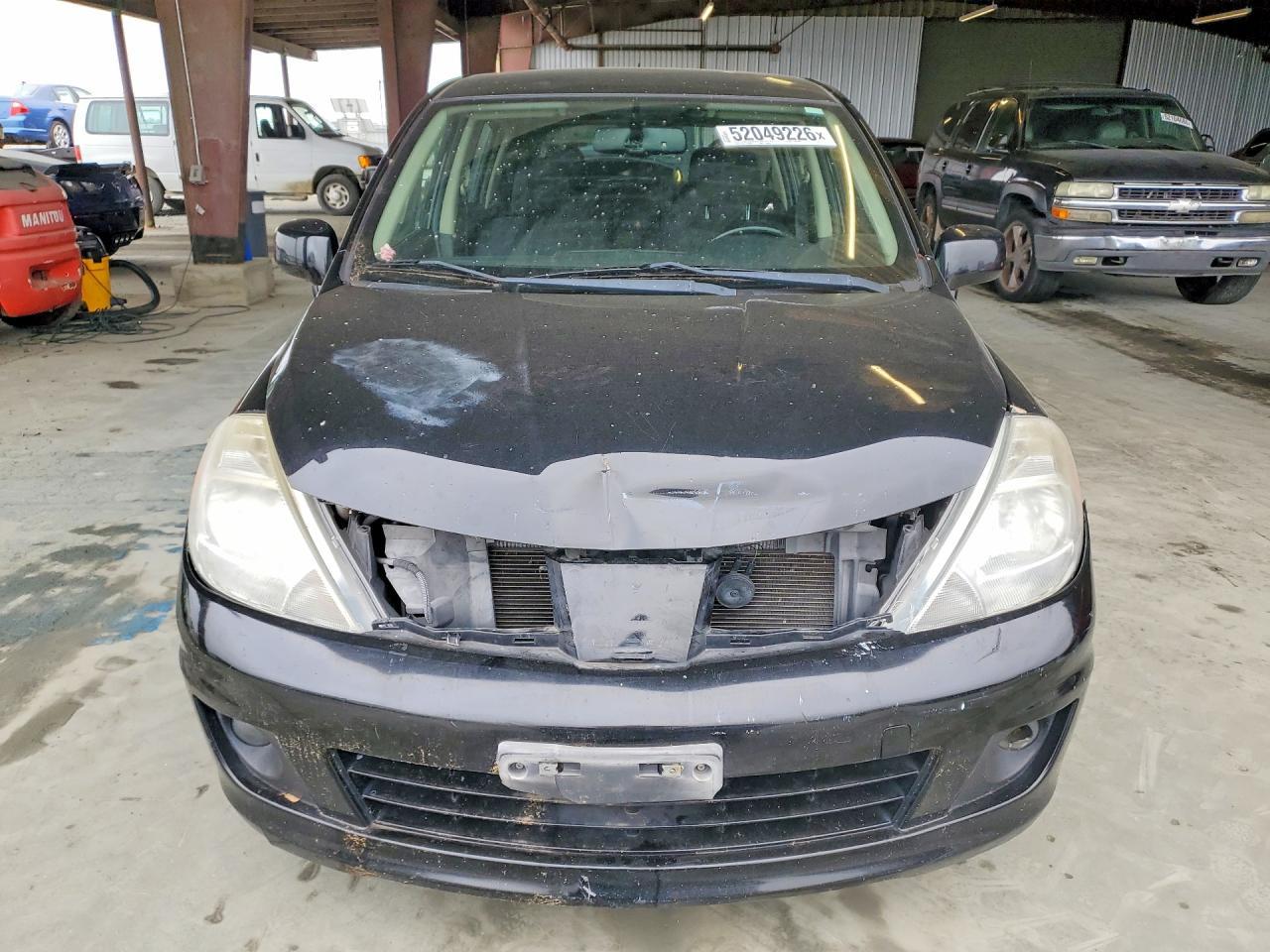 2012 Nissan Versa - Фото 5