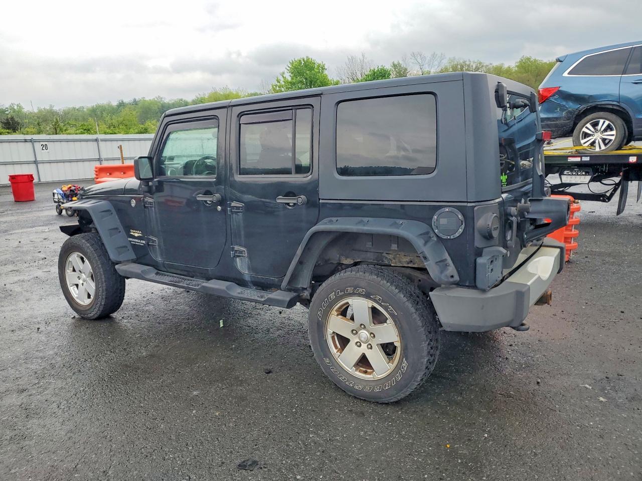 2010 Jeep Wrangler Unlimited Sahara - Фото 2