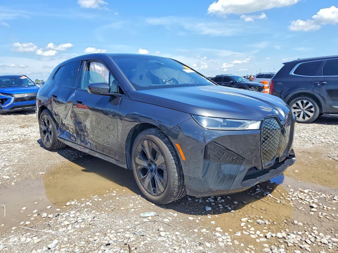 2025 BMW Ix xDrive50 - Фото 4