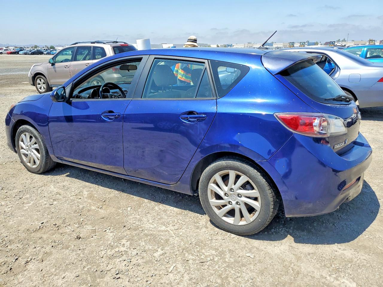 2012 Mazda 323 - Image 2
