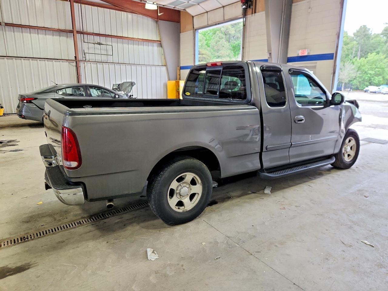 2002 Ford F150 - Фото 3