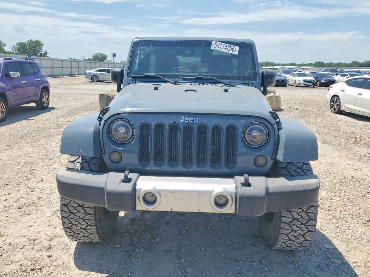 2014 Jeep Wrangler Unlimited Sahara - Фото 5