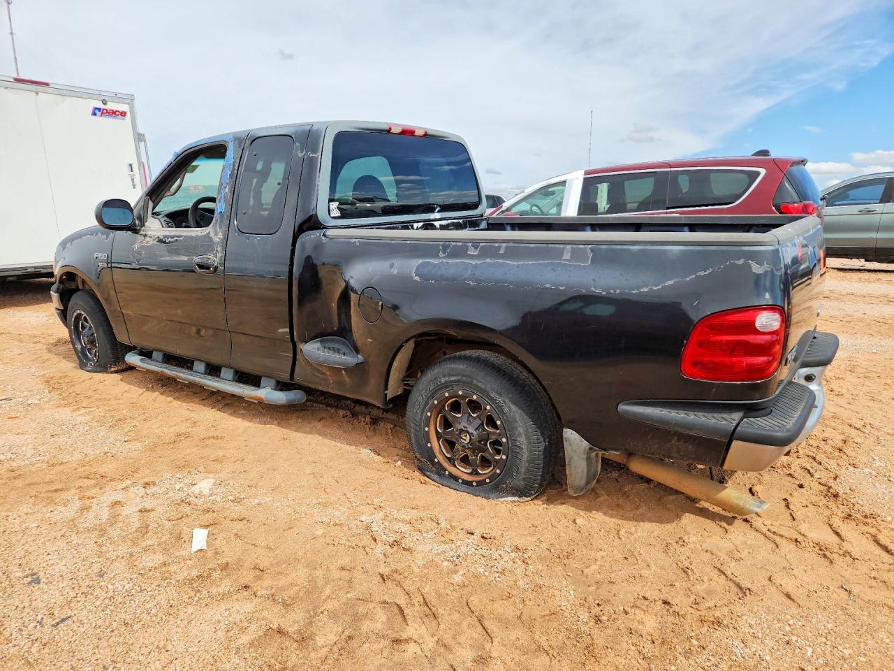 2000 Ford F150 - Фото 2