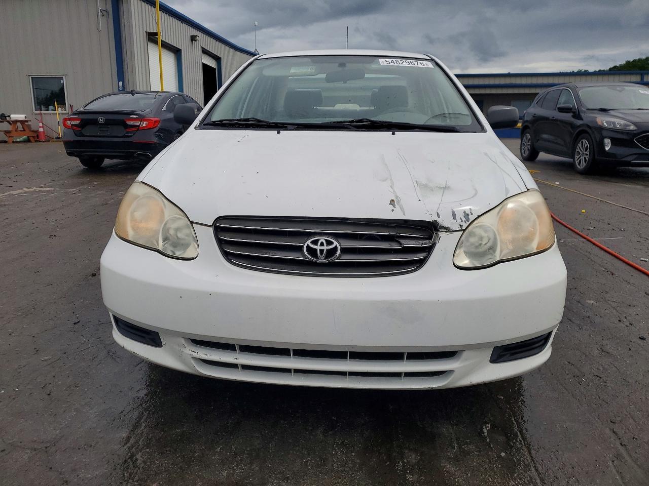 2004 Toyota Corolla Ce - Фото 5