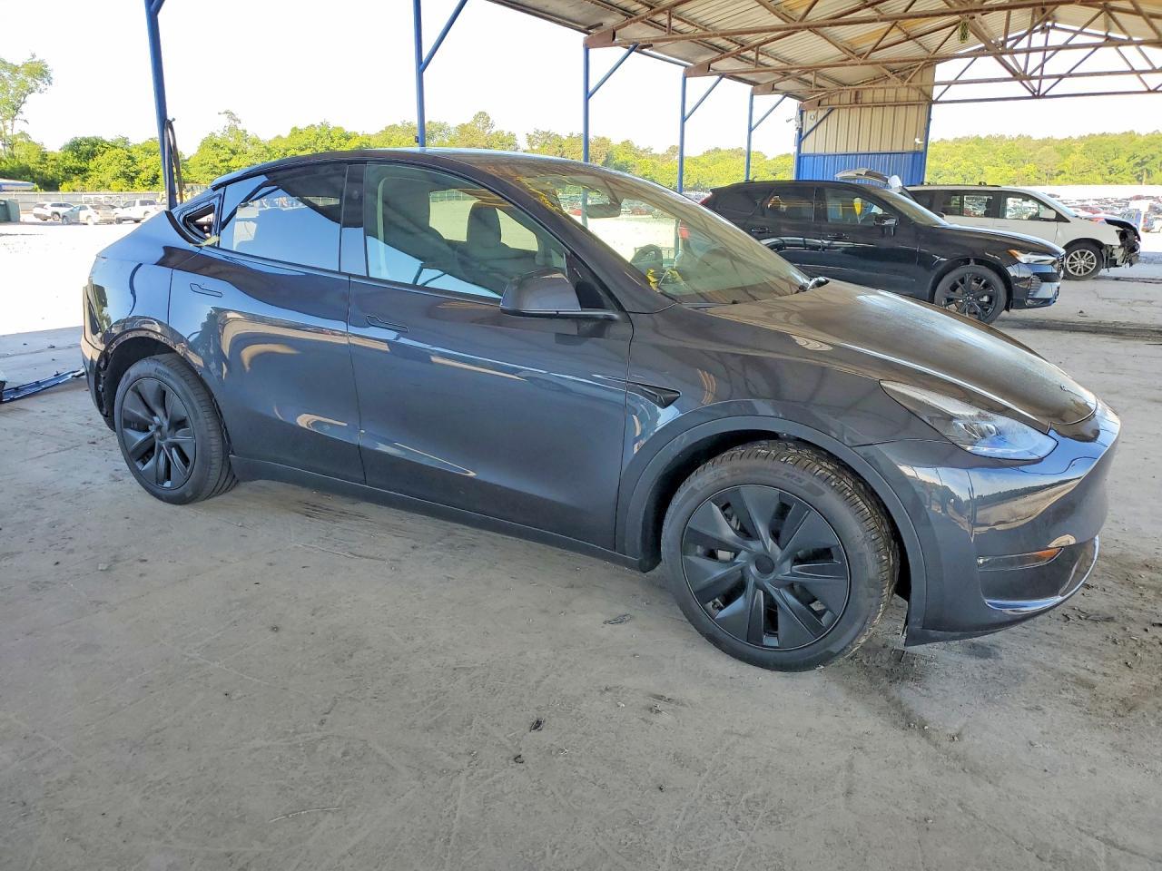 2025 Tesla Model Y - Фото 4