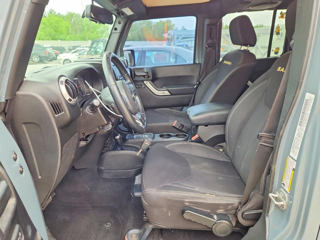 2014 Jeep Wrangler Unlimited Sahara - Фото 7