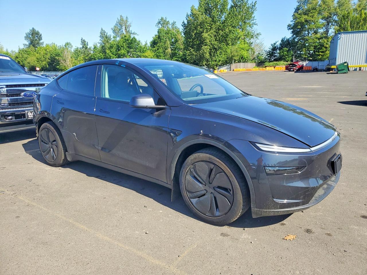 2026 Tesla Model Y - Фото 4