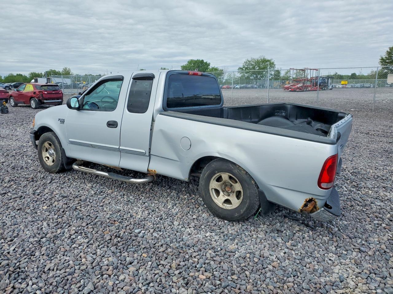 2003 Ford F150 - Фото 2