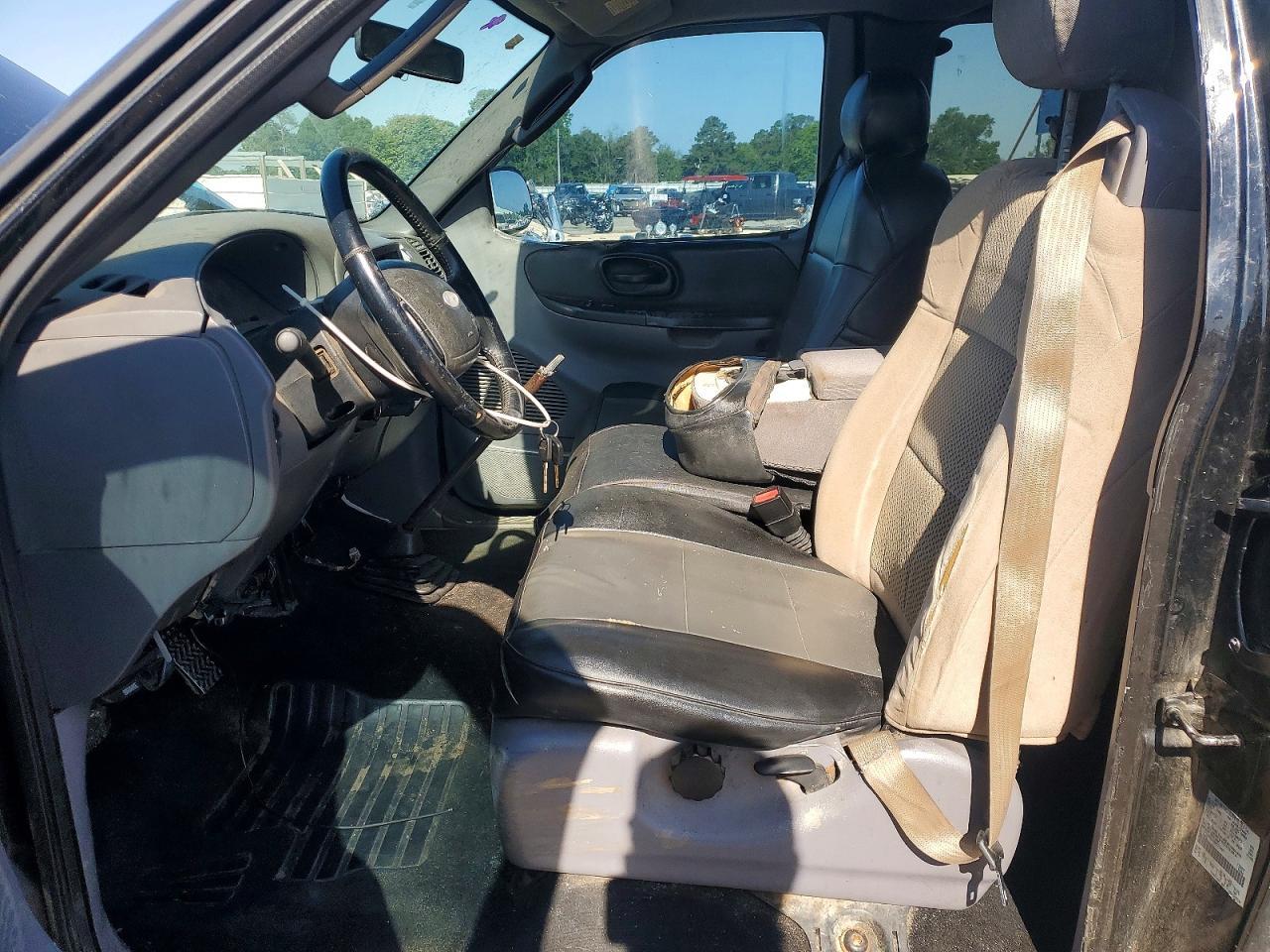 2003 Ford F150 - Фото 7