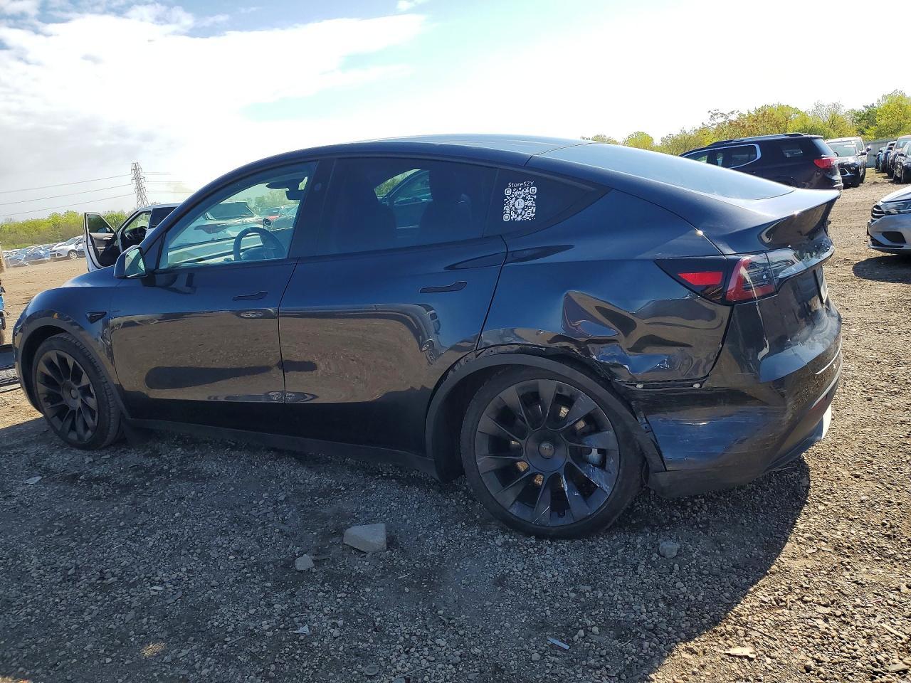 2024 Tesla Model Y - Фото 2