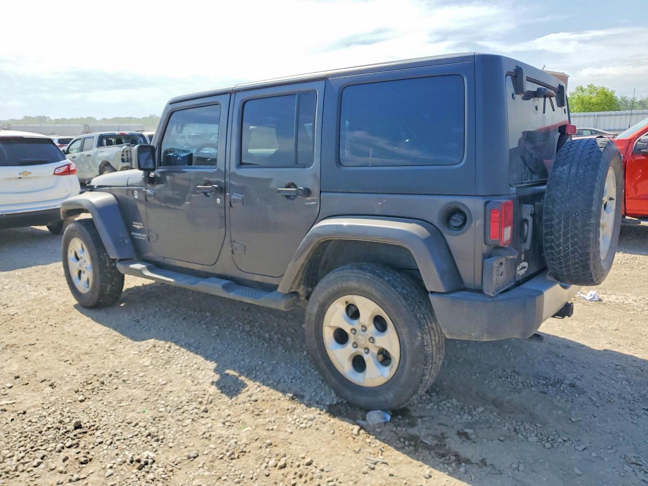 2014 Jeep Wrangler Unlimited Sahara - Фото 2