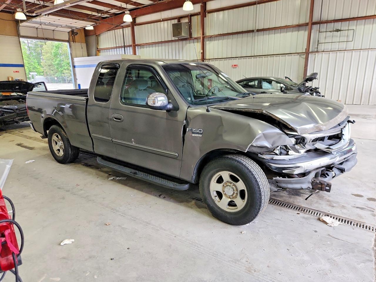 2002 Ford F150 - Фото 4