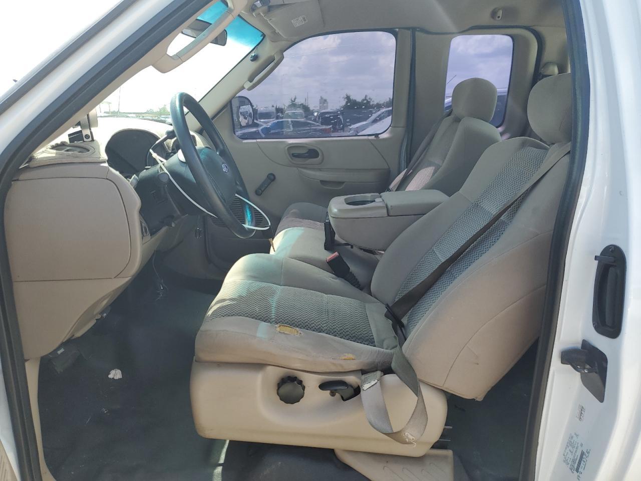 2003 Ford F150 - Фото 7