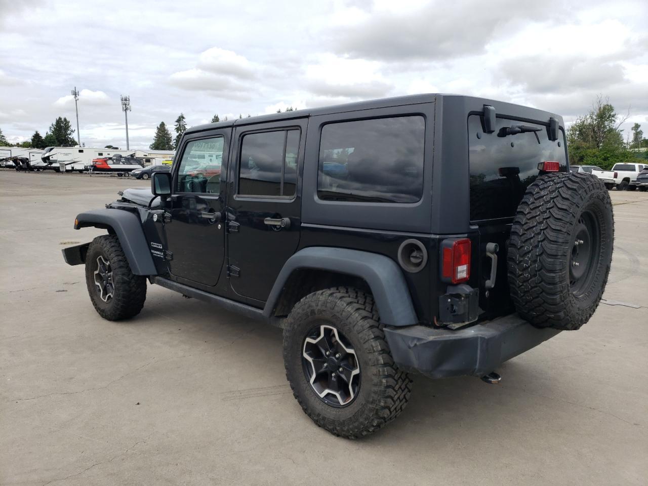 2013 Jeep Wrangler Unlimited Sport - Фото 2