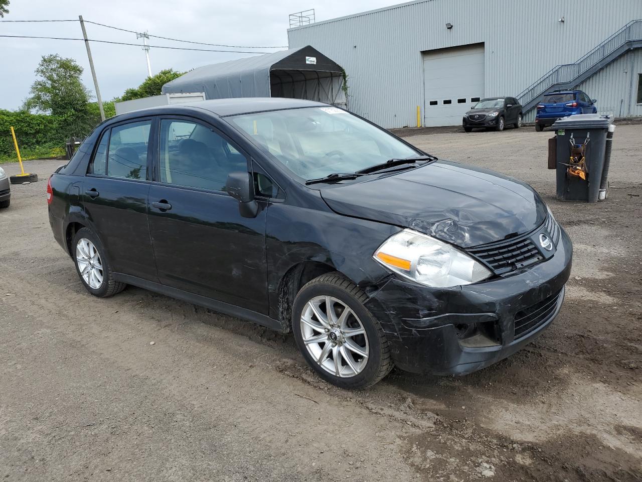 2011 Nissan Versa S - Фото 4