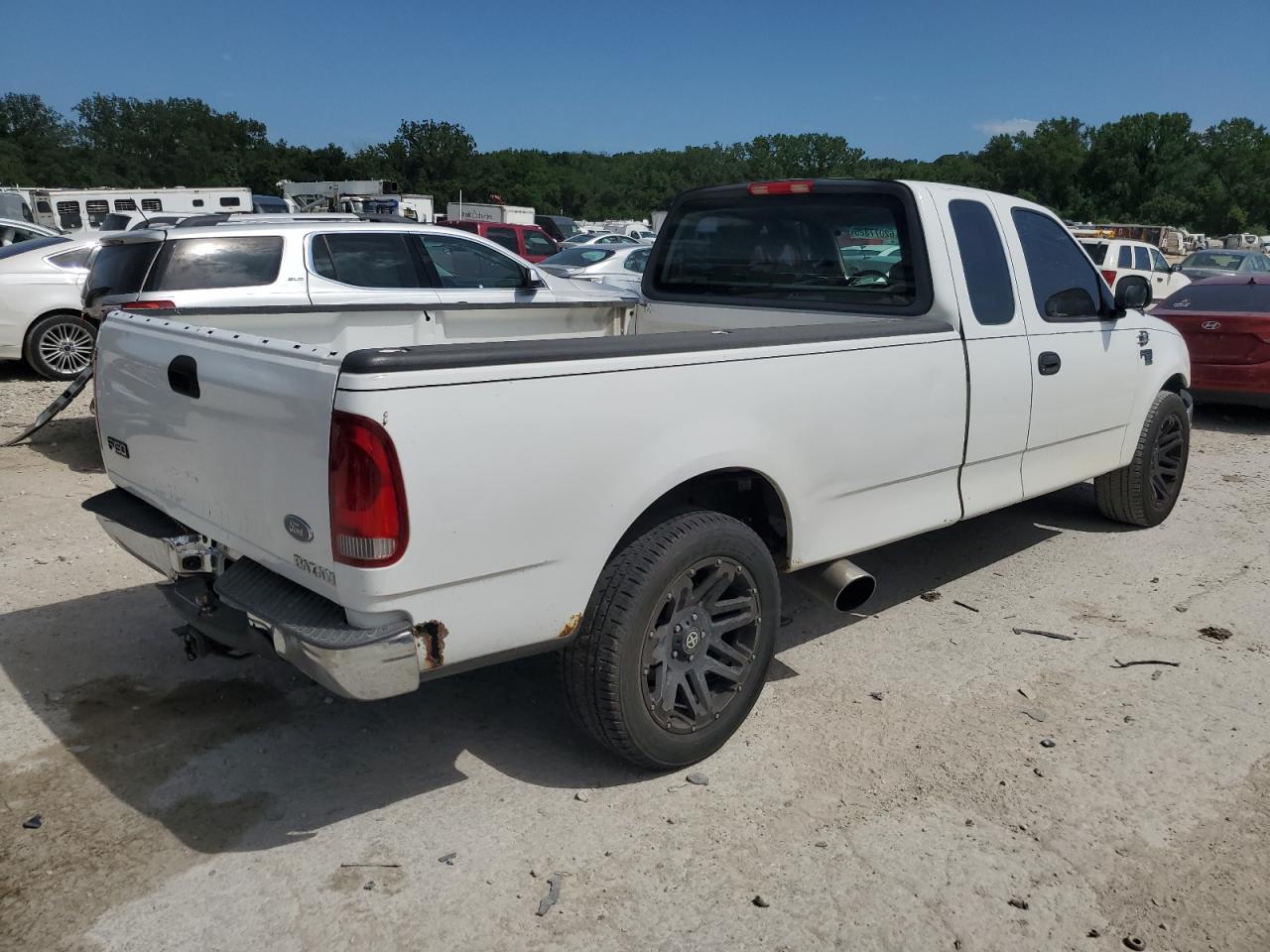 2003 Ford F150 - Фото 3