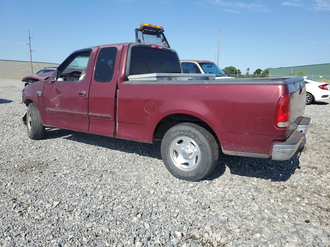 1999 Ford F150 - Фото 2