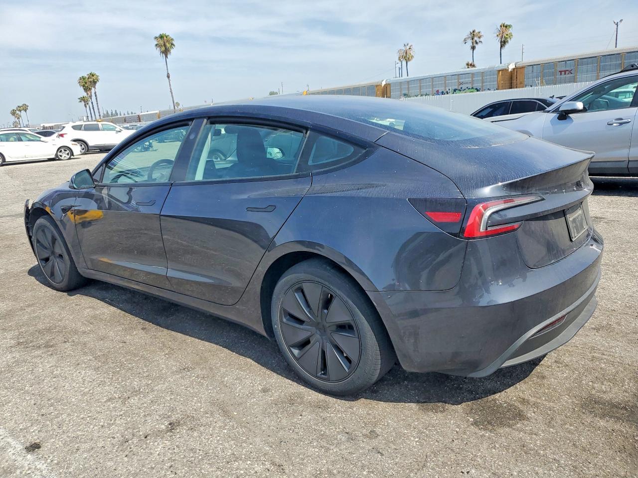 2024 Tesla Model 3 - Фото 2