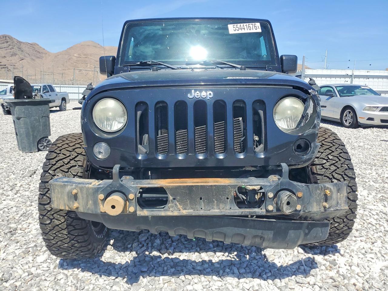 2014 Jeep Wrangler Unlimited Sahara - Фото 5