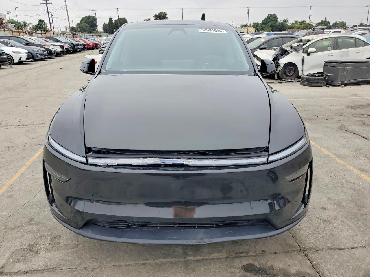 2026 Tesla Model Y - Фото 5