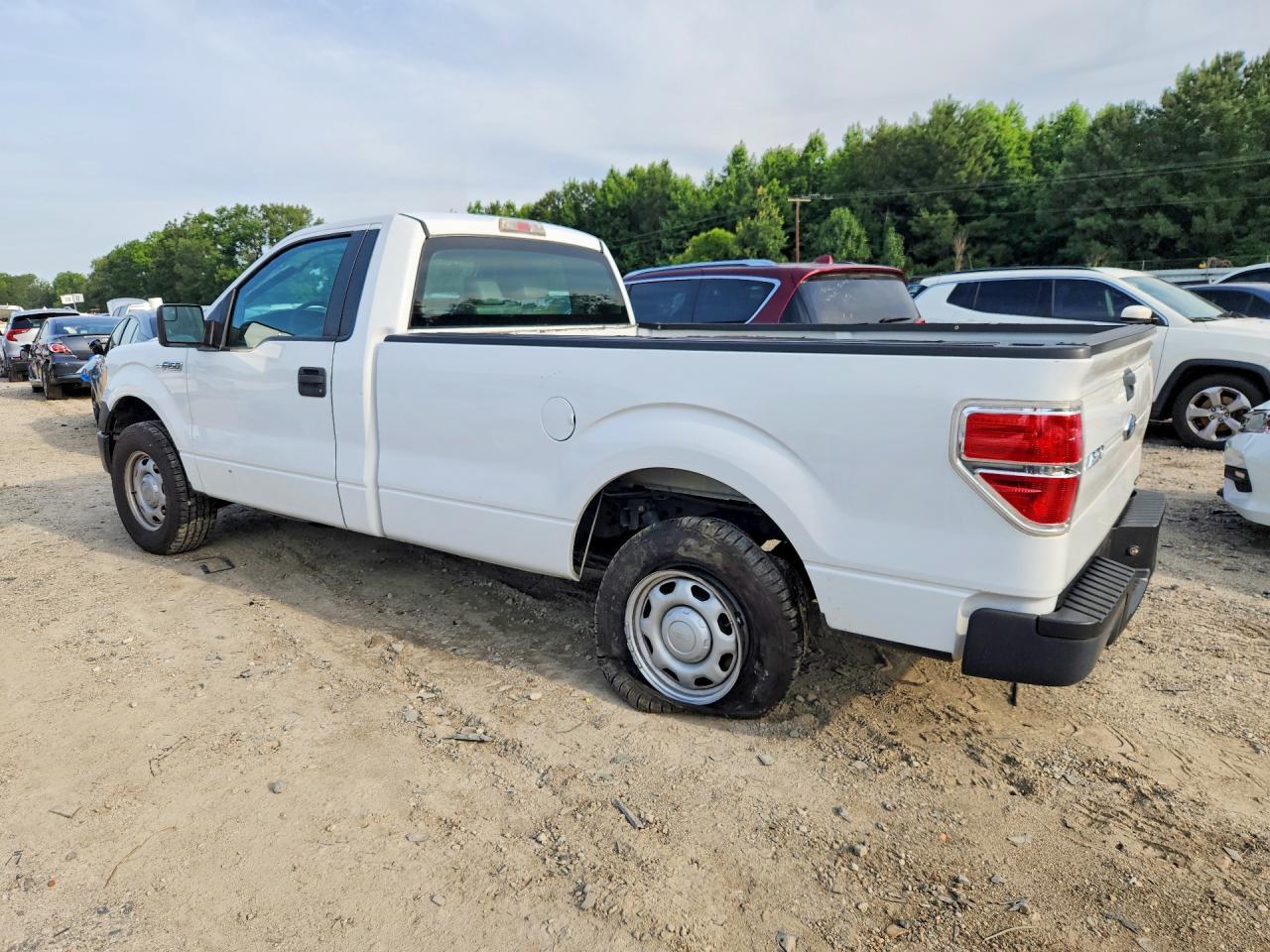 2011 Ford F150 - Фото 2