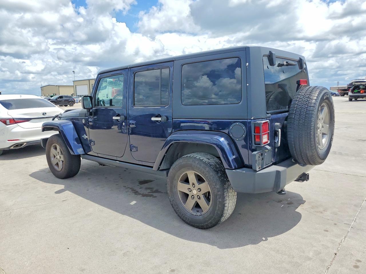 2013 Jeep Wrangler Unlimited Sport - Фото 2