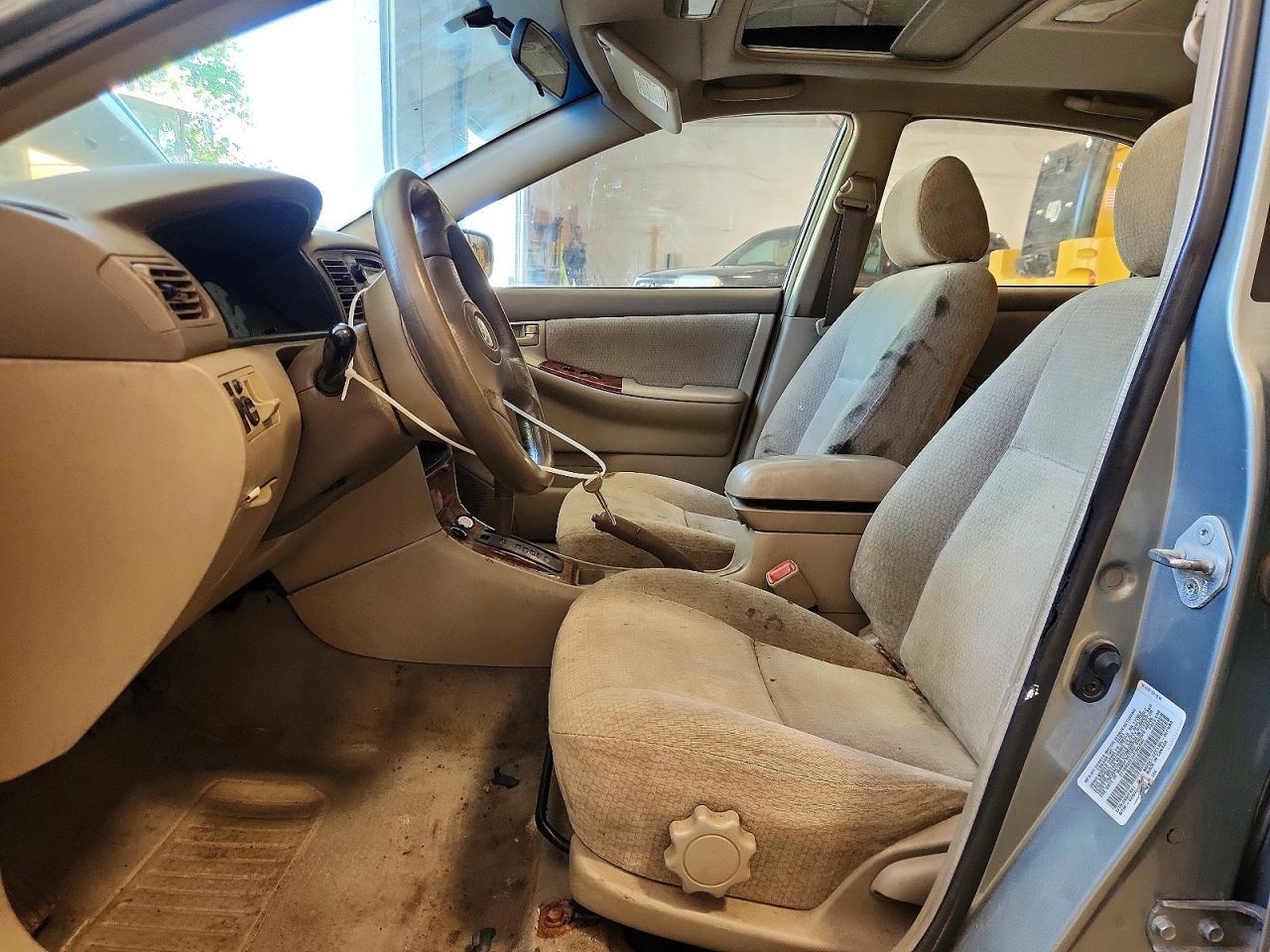 2004 Toyota Corolla - Фото 7