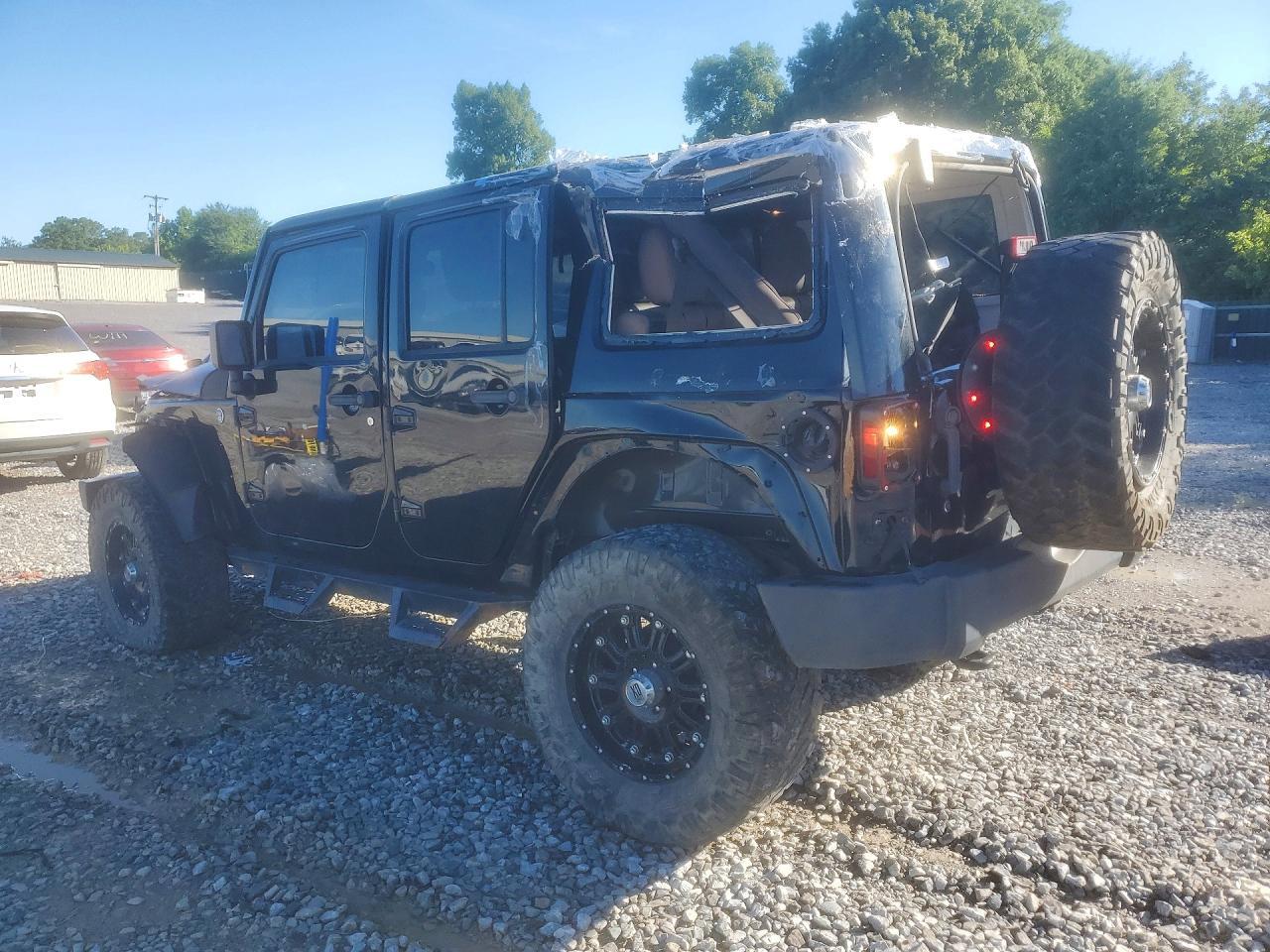 2014 Jeep Wrangler Unlimited Sahara - Фото 2