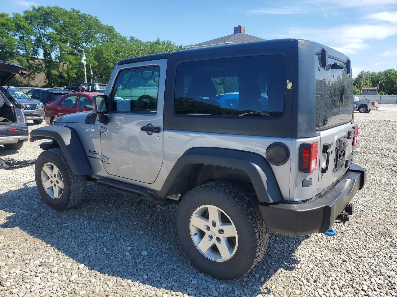 2015 Jeep Wrangler Sport - Фото 2
