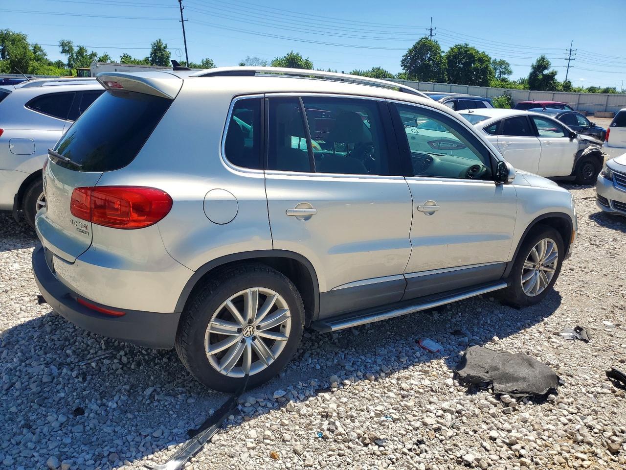 2014 Volkswagen Tiguan S - Фото 3