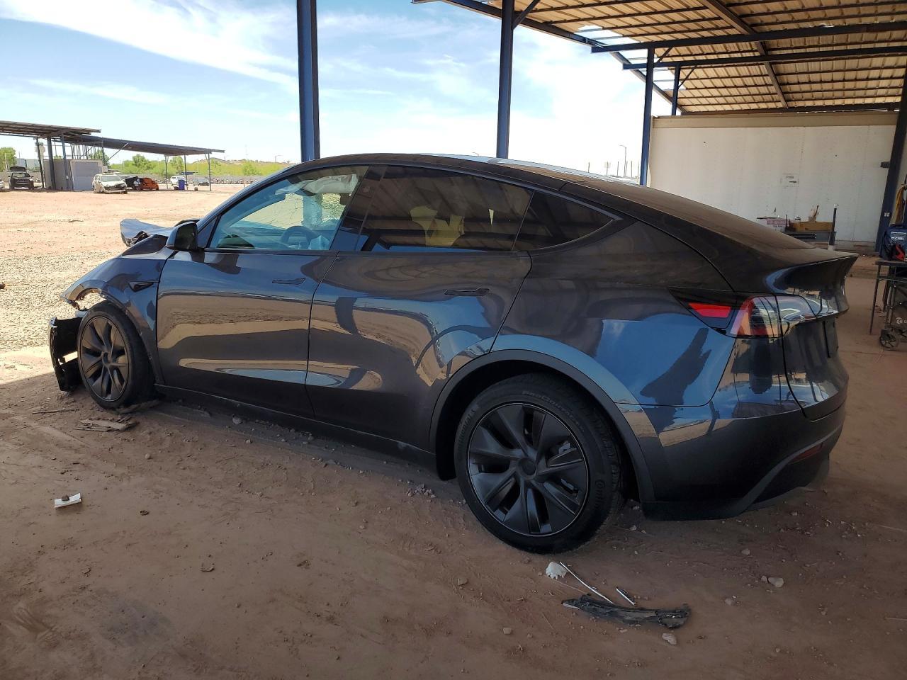2025 Tesla Model Y - Фото 2