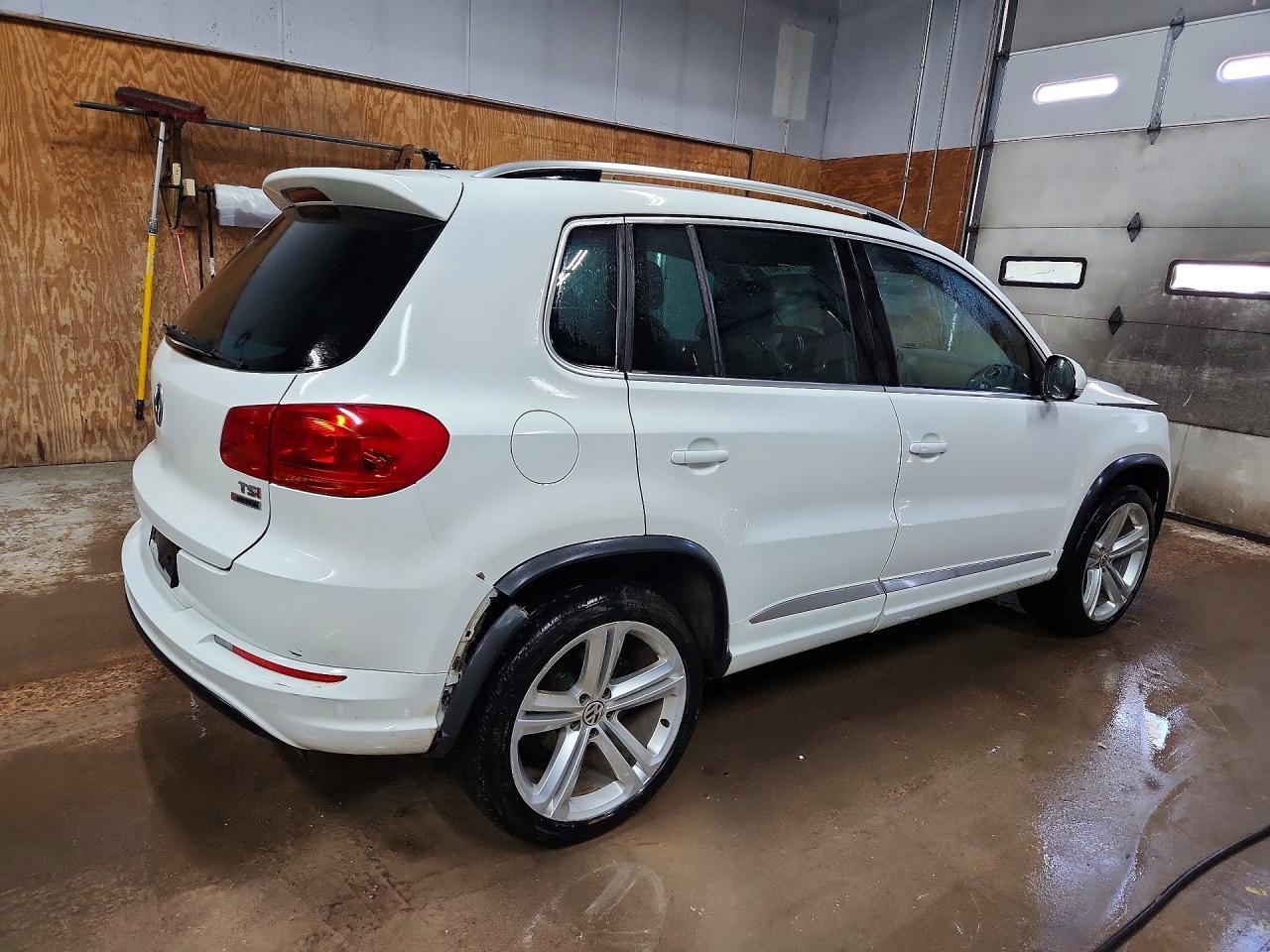 2016 Volkswagen Tiguan S - Фото 3