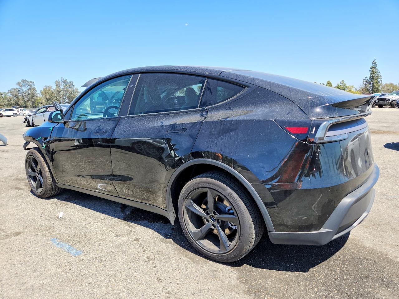 2026 Tesla Model Y - Фото 2