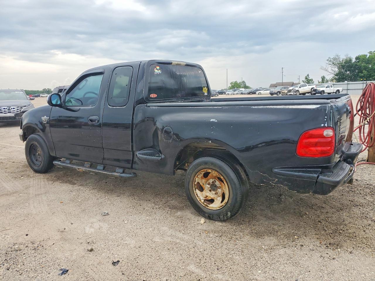 2003 Ford F150 - Фото 2