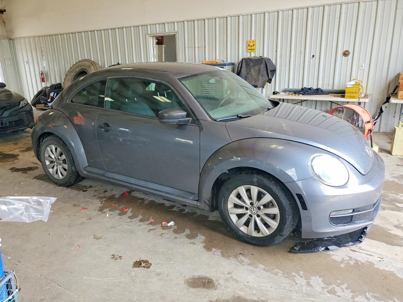 2016 Volkswagen Beetle 1.8T - Фото 4