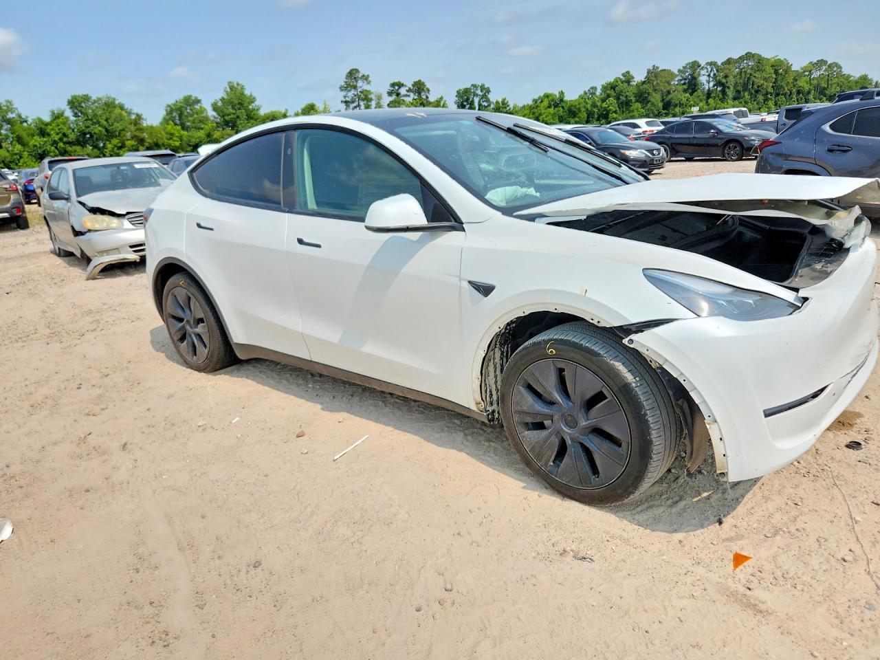 2025 Tesla Model Y - Фото 4