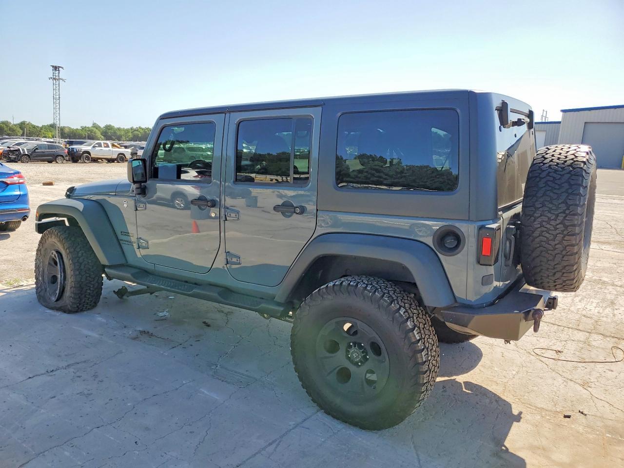 2014 Jeep Wrangler Unlimited Sport - Фото 2