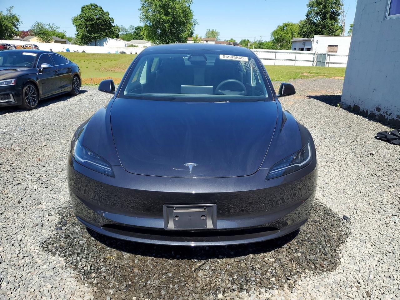 2025 Tesla Model 3 - Фото 5