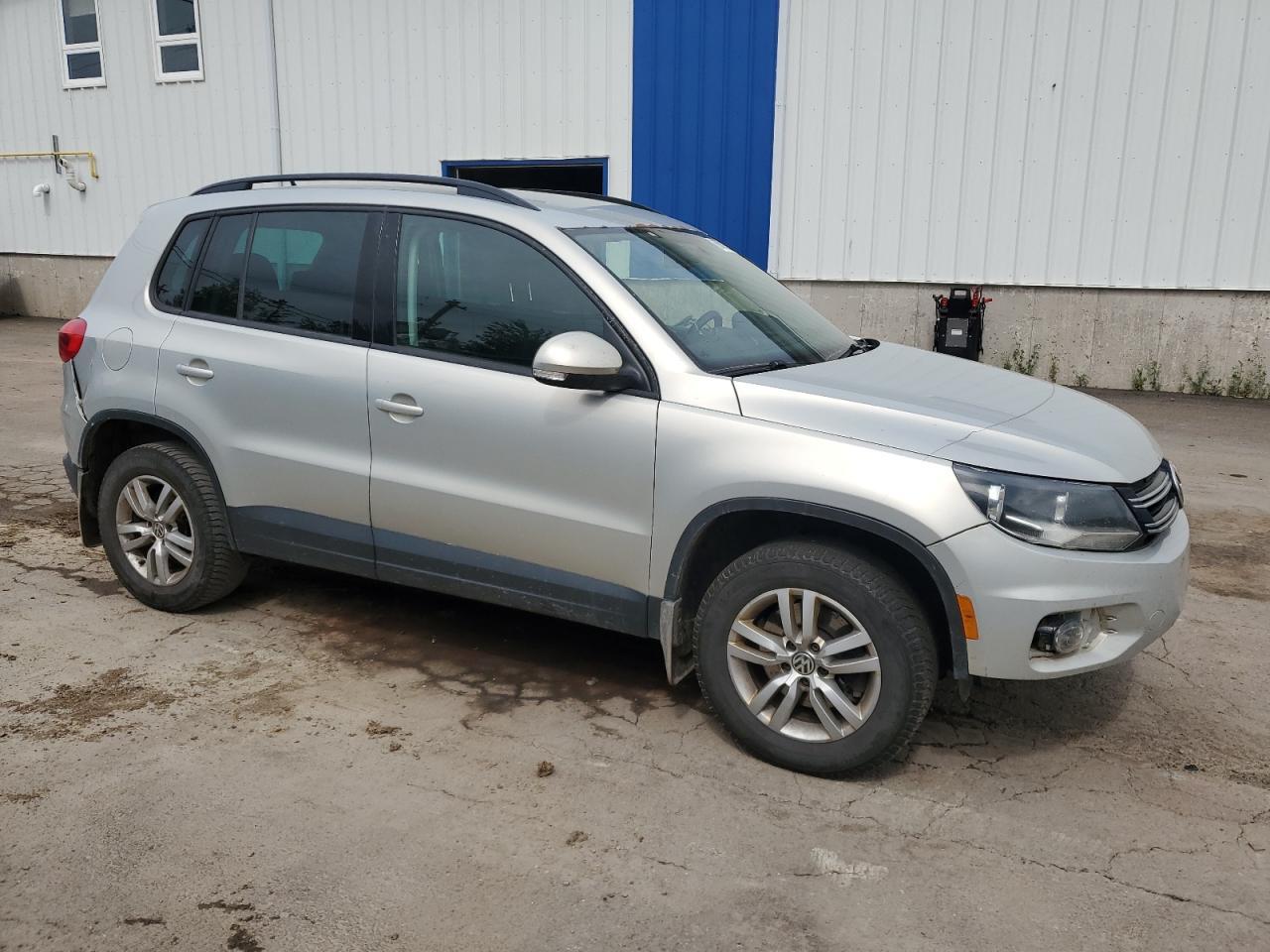 2014 Volkswagen Tiguan S - Фото 4