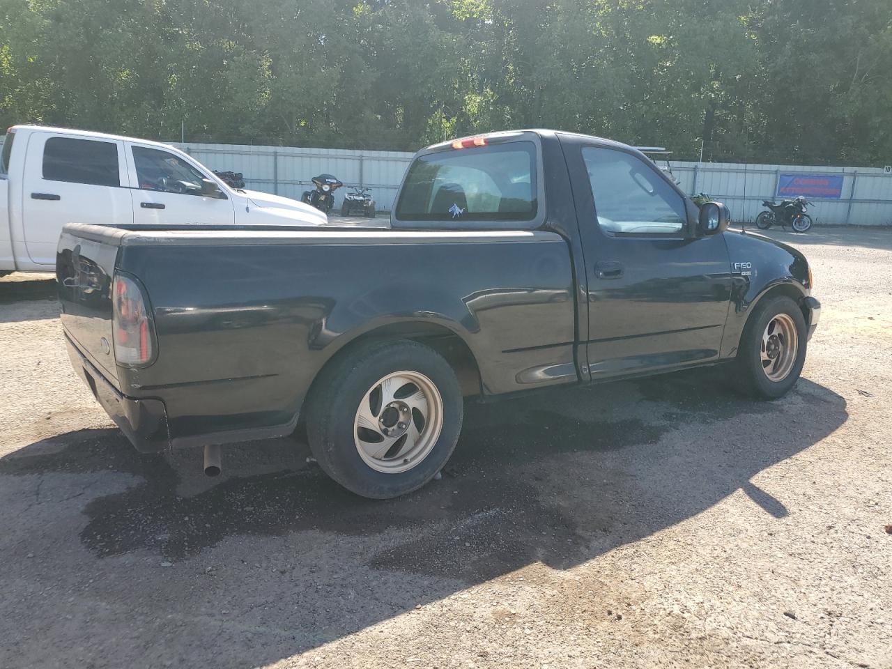 2002 Ford F150 - Фото 3