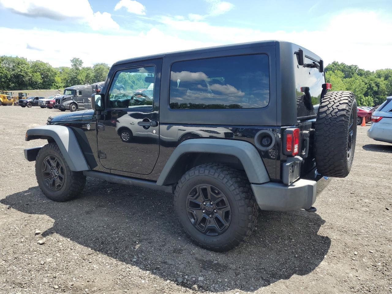 2015 Jeep Wrangler Sport - Фото 2